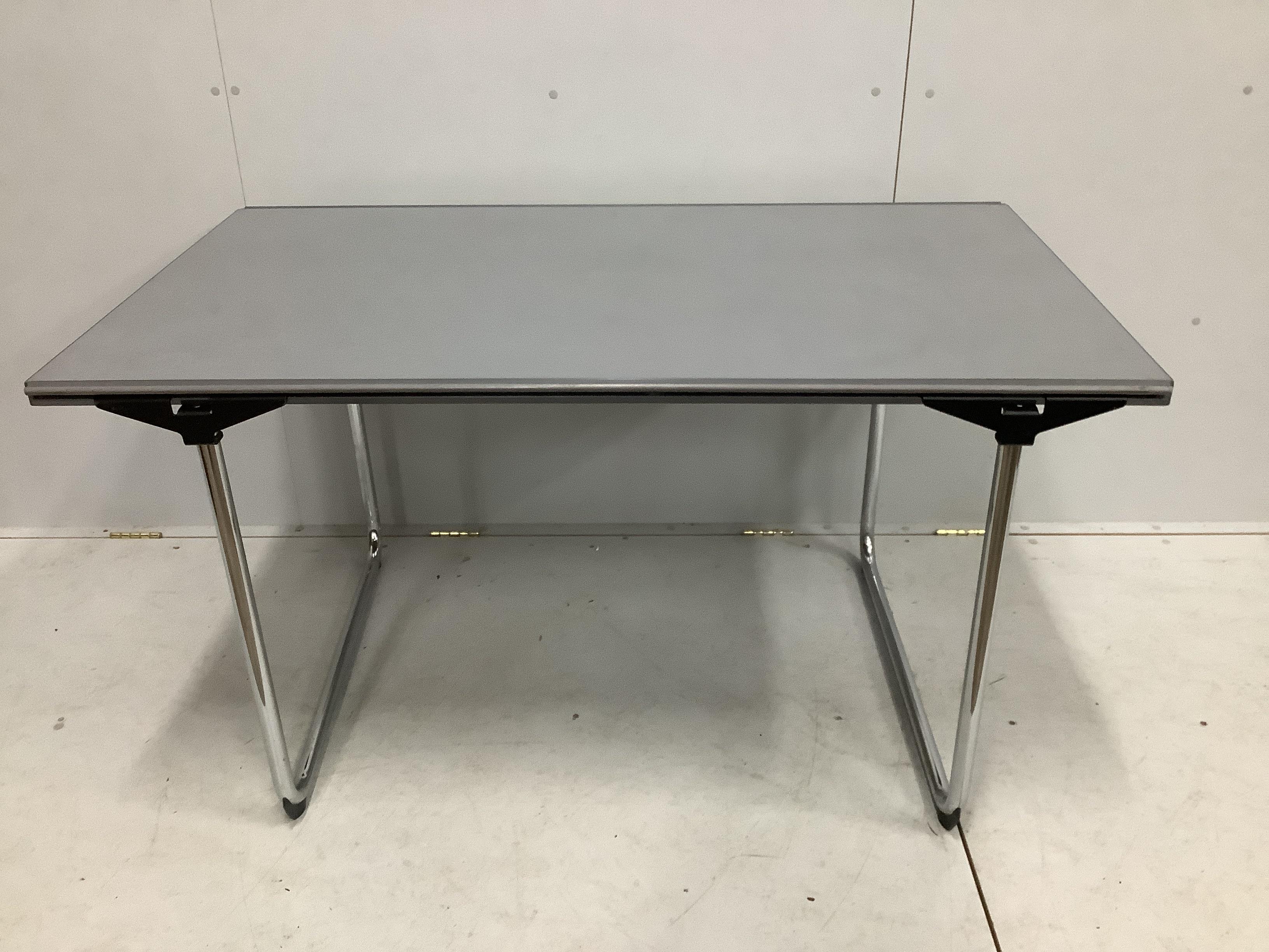 Erik Magnussen for Fritz Hansen - A rectangular dining table circa 1994, width 135cm, depth 80cm, height 75cm and four cantilever chairs in the manner of Marcel Breuer